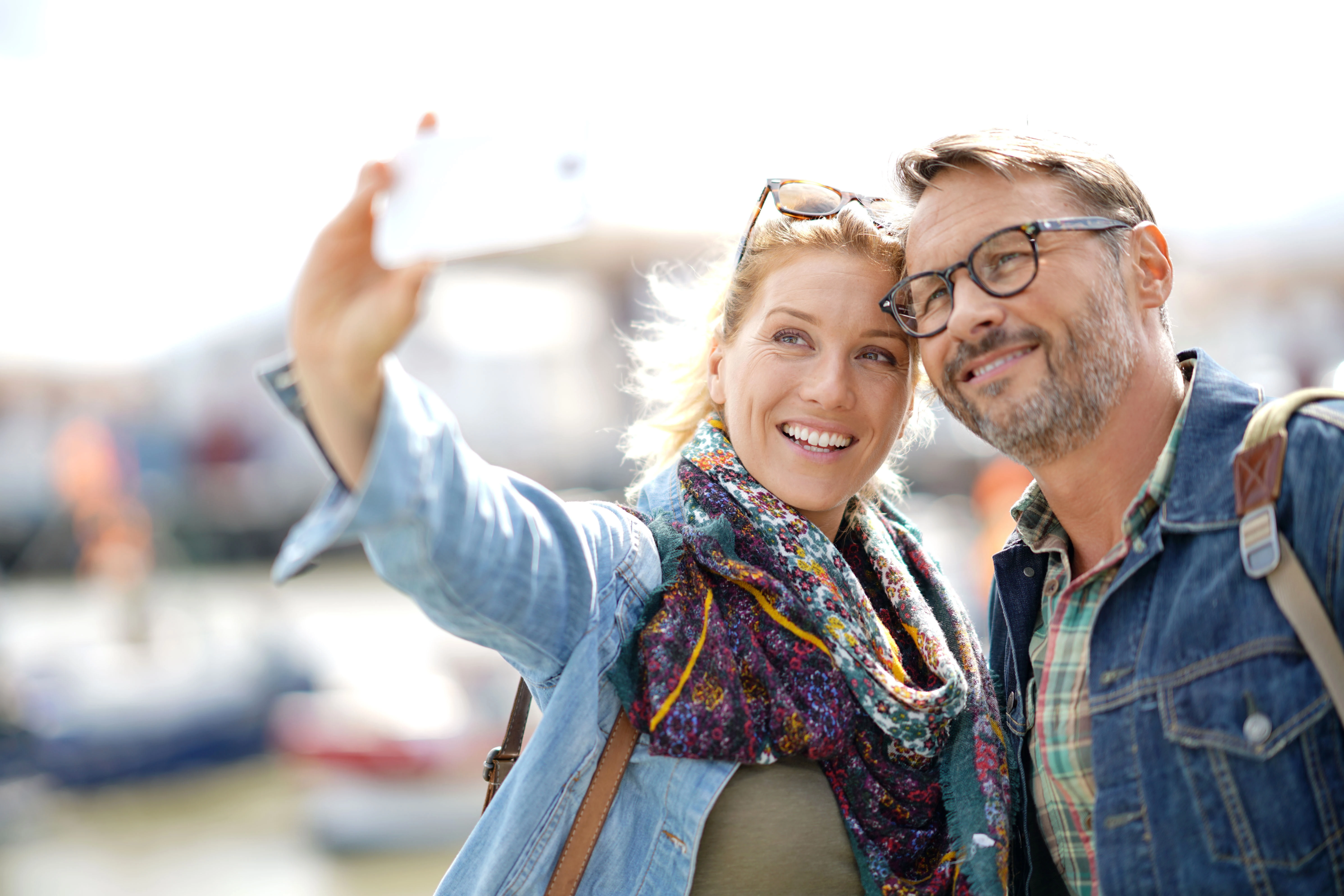 smiling couple taking a selfie