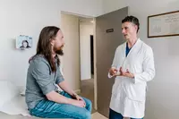 Dr. Pazona with a urology patient